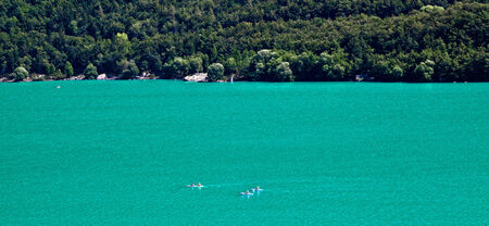 kayak on green lake in italyの写真素材