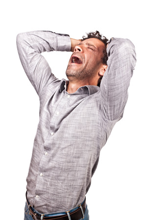 stressed caucasian man isolated on whiteの写真素材