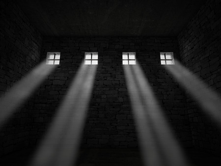 3d image of dark jail and bright windowの写真素材