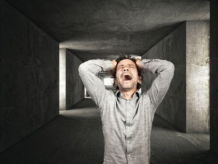 stressed man and dark tunnelの写真素材