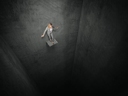 business woman and vertical tunnel prisonの写真素材