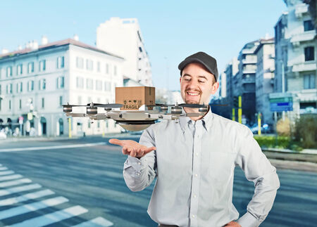 worker and modern drone deliveryの写真素材