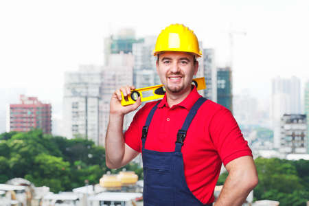 portrait of worker with spirit level