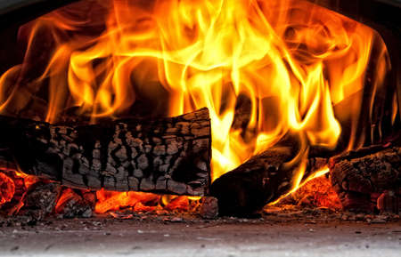 image of fire inside of wood hovenの写真素材