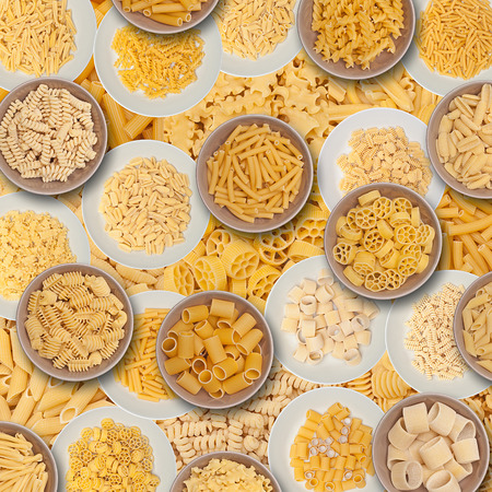 food background different kind of italian pastaの写真素材