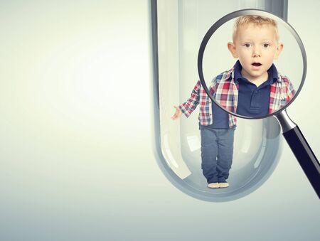 surprised child and tube vitro glass