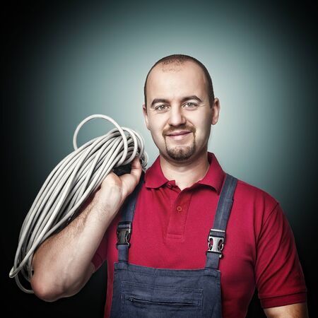smiling and confident electrician