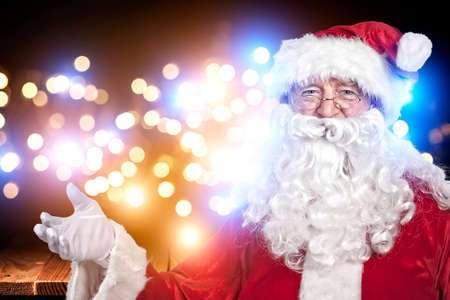 santa and glowing lights backgroundの写真素材