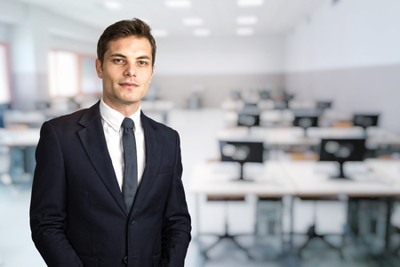 portrait of young businessman in working classの写真素材