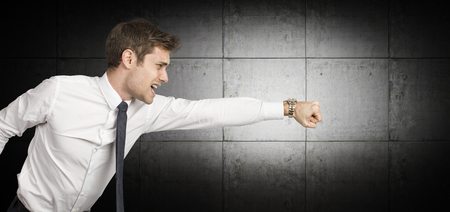 angry man and concrete empty room interiorの写真素材