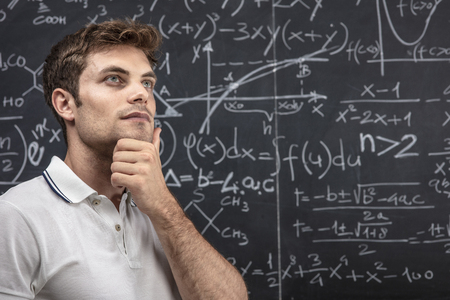 teacher portrait and chalkboard background