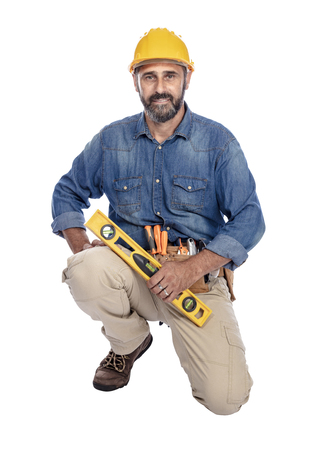 portrait of caucasian handyman isolated on whiteの写真素材
