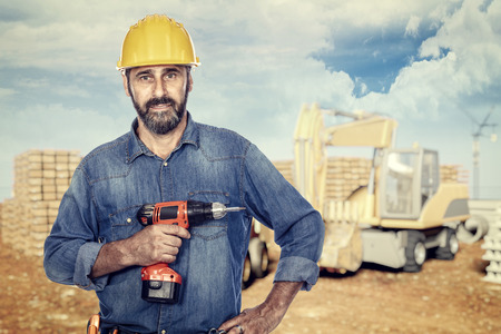 Handyman at work in construction site