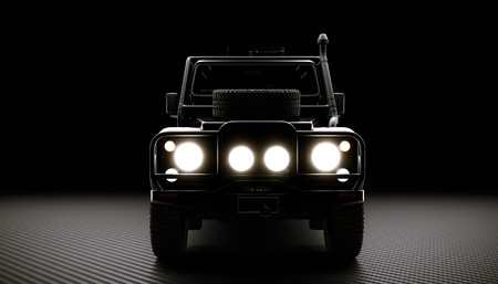 3d image render of a typical off-road vehicle on a carbon fiber background. headlights on.の写真素材