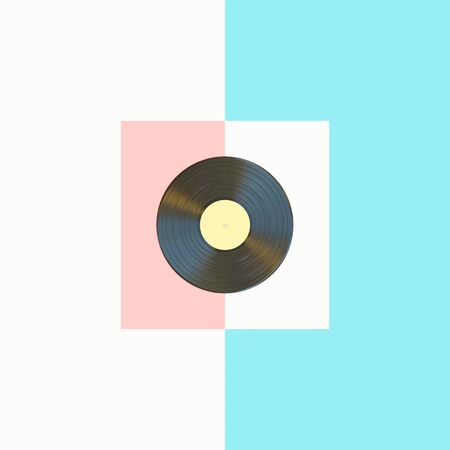 3d render image of a classic vinyl record on a light blue, pink and white background in a flat lay...