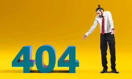 businessman looks at the writing of the 404 error without knowing what to do.