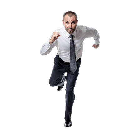 businessman running isolated on white. front view.の写真素材