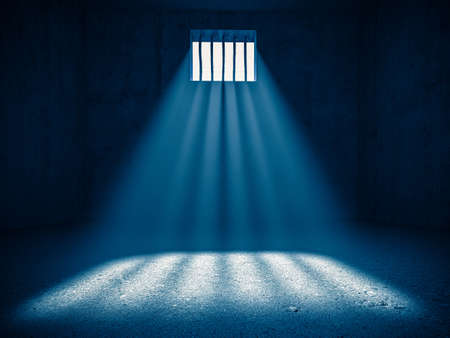 interior of a prison, light from a barred window. 3d render. concept of deprivation of liberty.の写真素材
