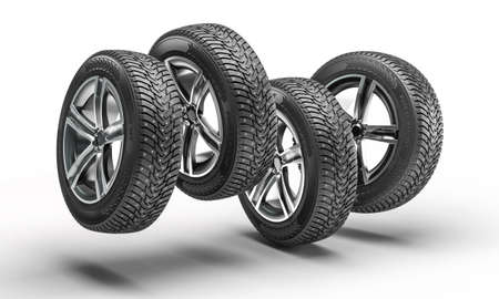 wheels with winter tires jumping on white background. 3d render