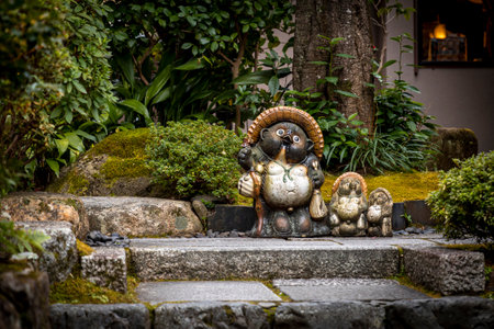 Japanese raccoon traditional statue in a Kyoto gardenの写真素材
