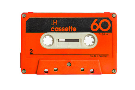 old isolated red music cassette on white backgroundの写真素材