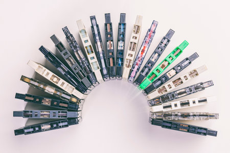 old cassettes arranged in an arc on a white backgroundの写真素材