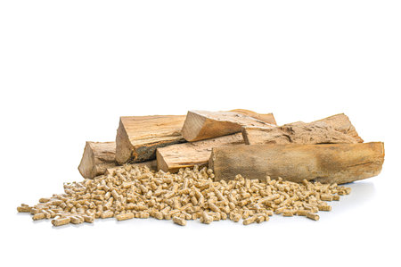 wood pellets and beech logs on whiteの写真素材