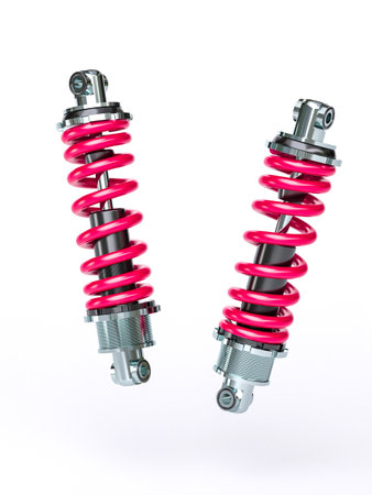 3d render of a pair of car shock absorbers over whiteの写真素材