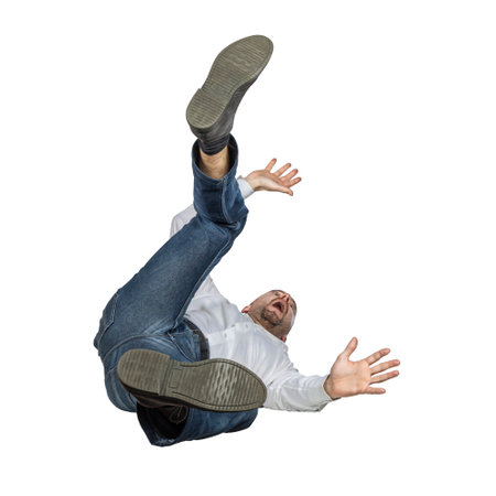 falling businessman isolated on whiteの写真素材