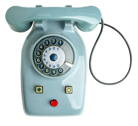 Isolated classic blue rotary dial phone, a throwback to mid-20th century communicationの写真素材