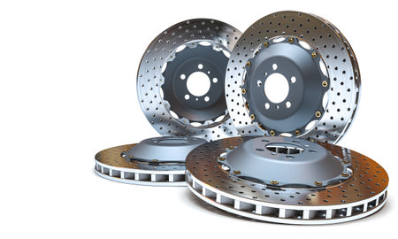 three ventilated car brake discs isolated on white background copyspaceの写真素材