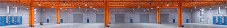 Wide-angle view unoccupied industrial warehouse orange beams gray wallsの写真素材