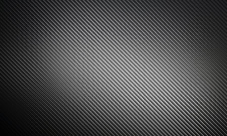 Dark carbon fiber background with diagonal weave 3d patternの写真素材