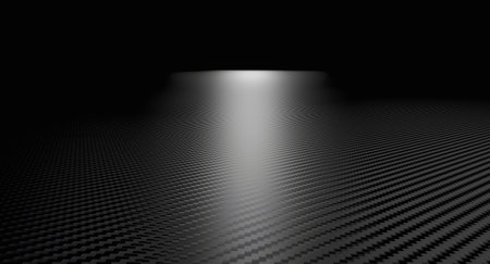 Light beam illuminating textured carbon fiber surface 3d backgroundの写真素材