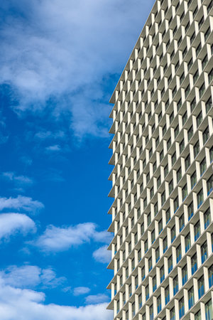Modern building facade with repetitive geometric patternの写真素材