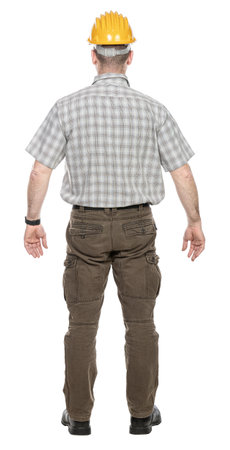 Rear view of a builder with yellow helmet standing on transparent backgroundの写真素材