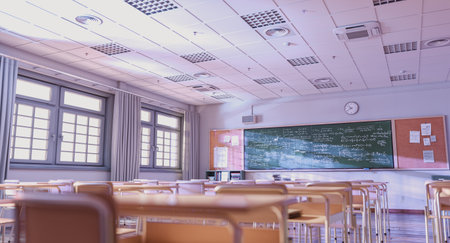 3d empty classroom with math formulas on blackboardの写真素材