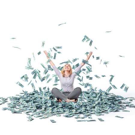 Happy woman sitting fallen money successの写真素材