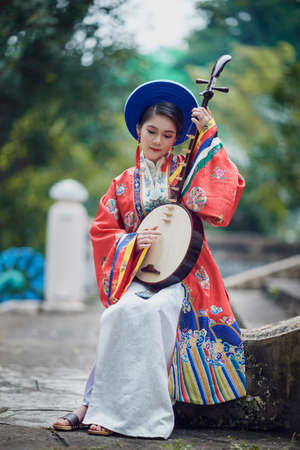 Ho Chi Minh city, Viet Nam: Vietnamese girls wear ancient costumesの写真素材