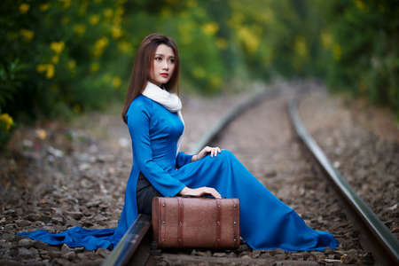 Ho Chi Minh city, Viet Nam: Ao Dai, Vietnamese traditional costumeの写真素材