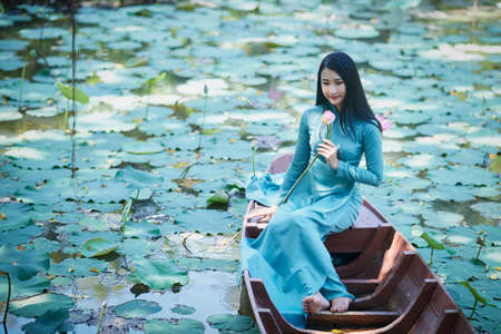 Ho Chi Minh City, Vietnam: Portrait of a Vietnamese girl in ao daiの写真素材