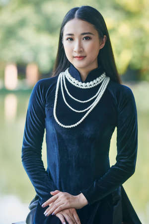 Ho Chi Minh city, Viet Nam: Ao Dai, Beautiful girl in Vietnamese traditional costumeの写真素材