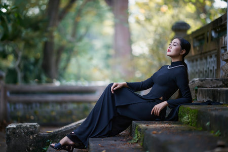 Ho Chi Minh city, Viet Nam: Ao Dai, Beautiful girl in Vietnamese traditional costumeの写真素材