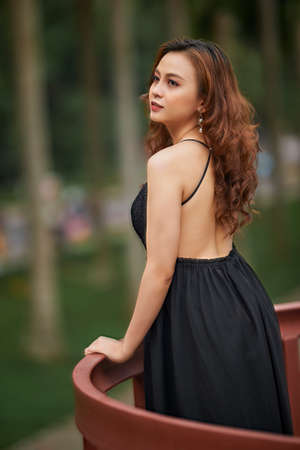 Ho Chi Minh city, Viet Nam: Portrait of a beautiful Vietnamese girl in the sunset