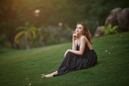 Ho Chi Minh city, Viet Nam: Portrait of a beautiful Vietnamese girl in the sunset
