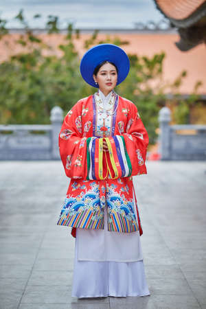 Ho Chi Minh City, Vietnam: Vietnamese girls wear ancient costumes to go to pagodasの写真素材