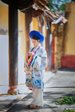 Ho Chi Minh City, Vietnam: Vietnamese girls wear ancient costumes to go to pagodas