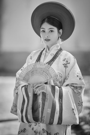 Ho Chi Minh City, Vietnam: Vietnamese girls wear ancient costumes to go to pagodasの写真素材