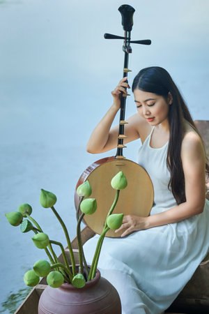 Ho Chi Minh City, Vietnam: beautiful girl in Vietnam traditional dress (costume Vietnamese name called Yem)の写真素材
