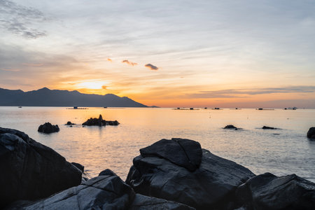 Sunrise at sea in Nha Trang city, Khanh Hoa province, Vietnamの写真素材